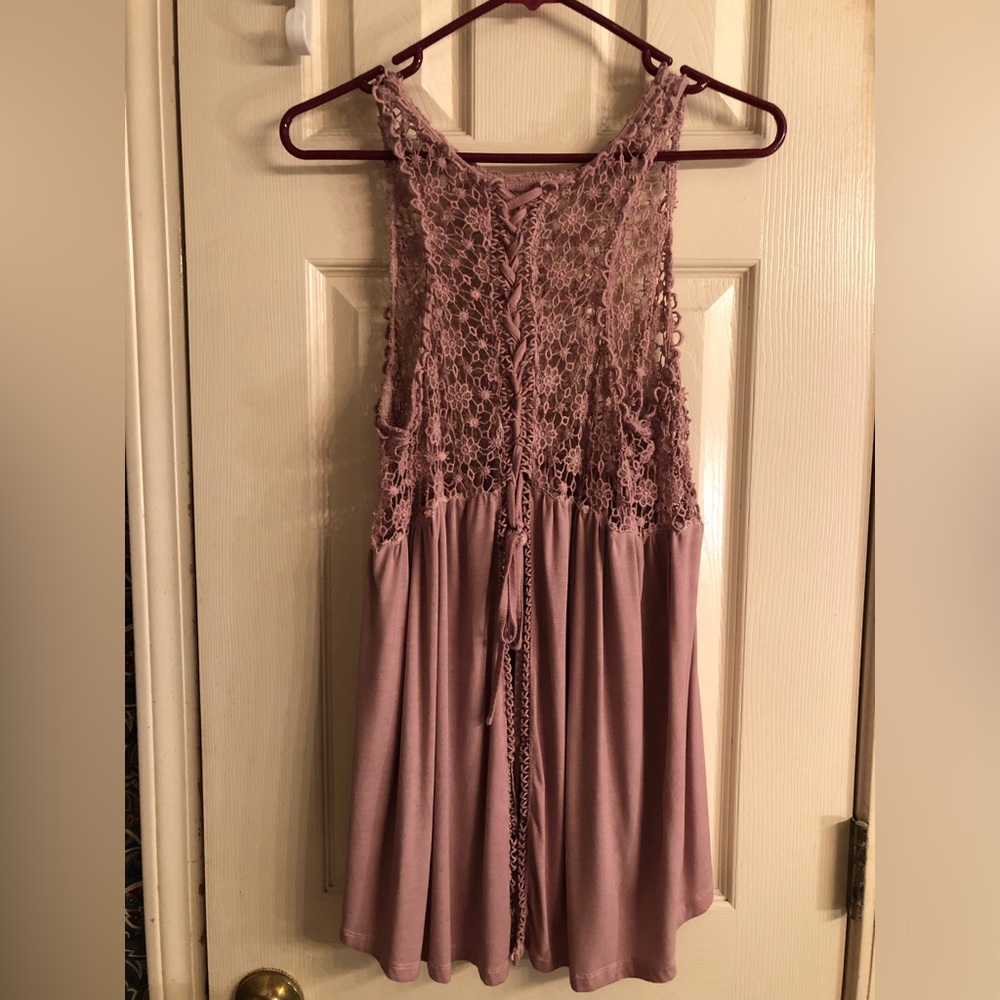 Sleeveless see thru split belly top size medium